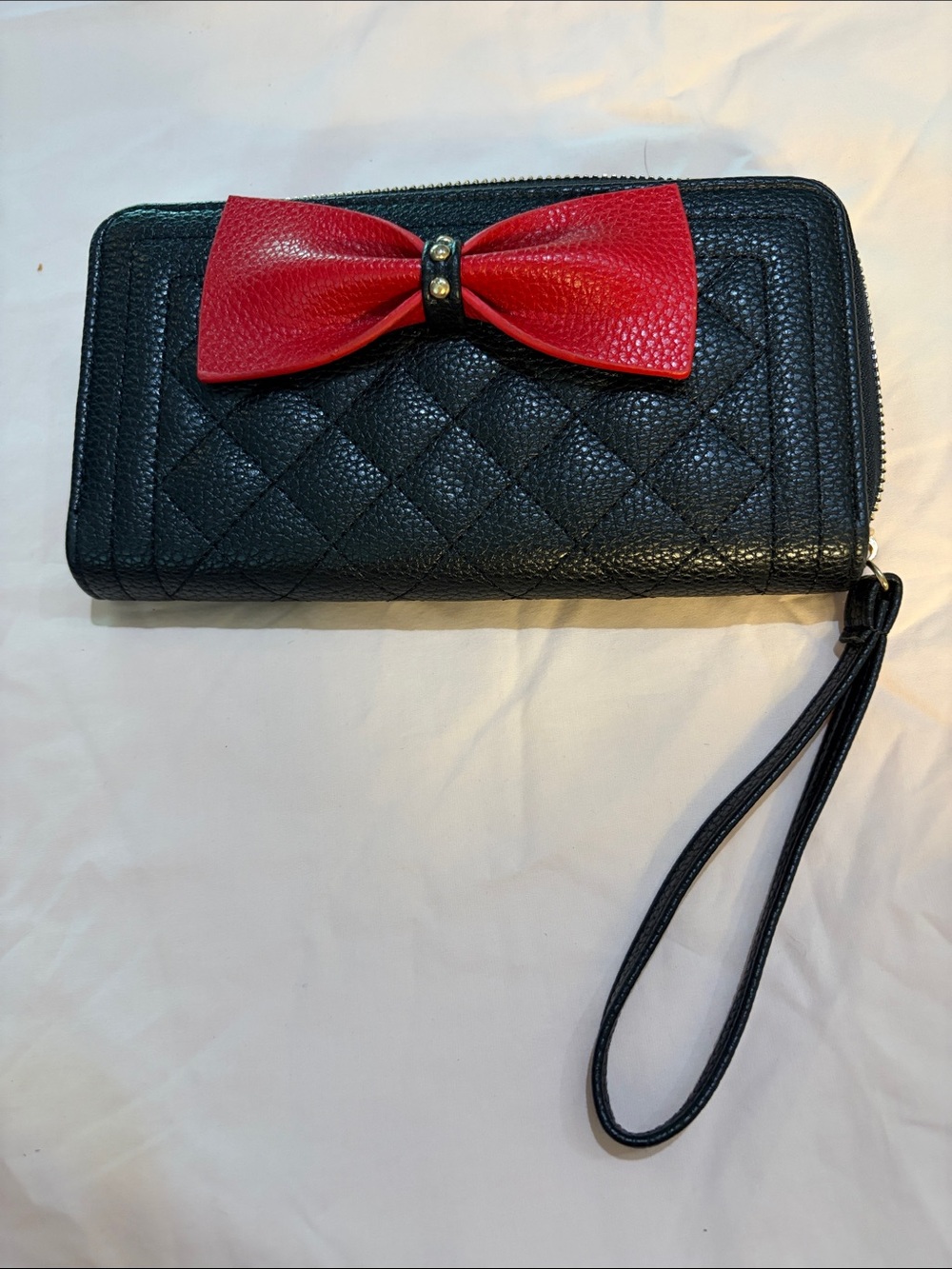 Olivia Miller Black Quilted Wristlet with Red Bow